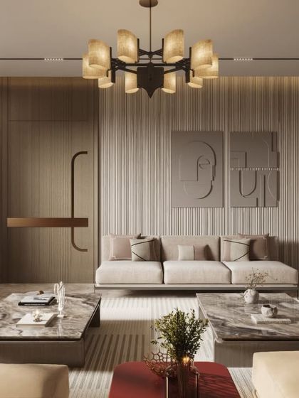 A collection of views from a contemporary living room, where neutral tones and varied textures create a calm, sophisticated environment. We've focused on the interaction of different materials, from the plush striped chairs to the marble coffee tables.