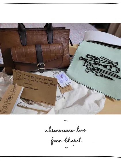 A peek at a special delivery for a patron in Bhopal. This shows our Rohini pouch with Kardana embroidery of tailor's tools, alongside a Little Parker bag in a Madagascar croc-embossed leather.