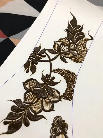 A close-up of the practice design. Notice the fine details in the flowers and the delicate swirls.