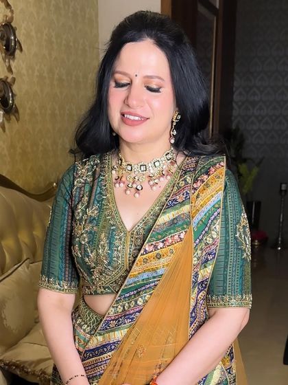 A close-up of the soft and elegant makeup for the mother of the bride. The focus is on creating a smooth, lifted look for mature skin.