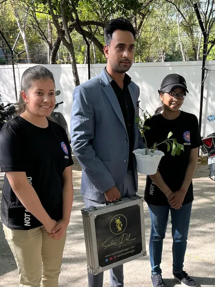 After my show at Shri Ram College of Commerce, receiving a plant as a token of appreciation from the students.