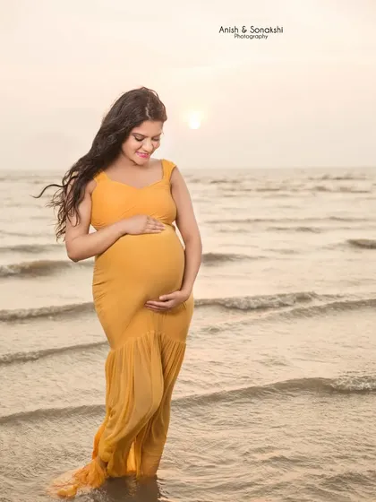 There's nothing like that golden hour glow. We captured this serene moment at the beach as the sun was setting, wrapping this beautiful mama-to-be in warm, magical light. It’s a perfect setting for a tranquil pregnancy photoshoot.