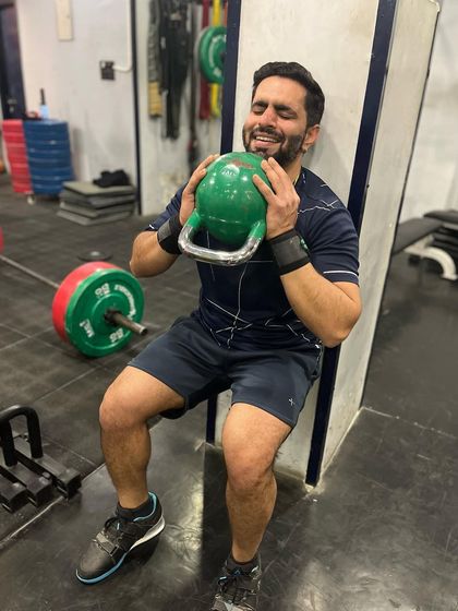 That face you make during a tough wall-sit. This is the look of determination on a Monday, pushing through the burn to start the week strong. How was your Monday workout?