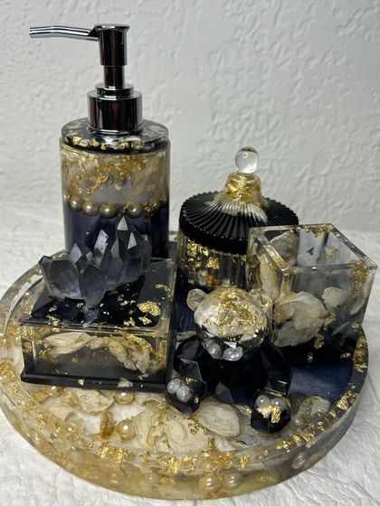 A close-up of the bathroom organizer set, showing the details of the preserved rose petals and pearls. The set can be customized in different colors to match your decor.