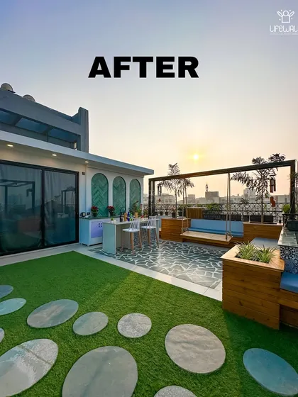 The completed terrace project, featuring a bar, a swing, and a lounge area. This "after" shot shows how different elements can be combined to create a cohesive and functional space.