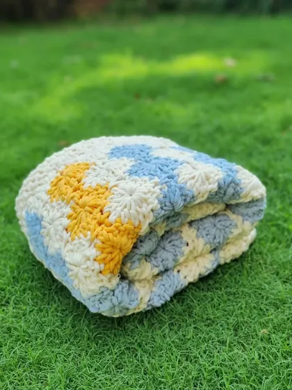 The baby blanket, all folded up and ready to be gifted. I get such lovely feedback on these, and I'm so happy they bring comfort to little ones.