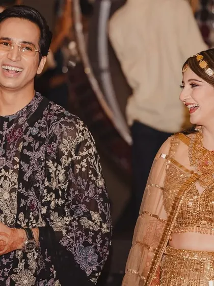 Laughter and love. A candid shot of the couple enjoying a light-hearted moment during their Sangeet.