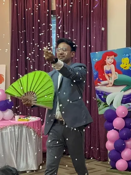 A wide shot of the snow illusion at the birthday party, creating a magical memory for the kids.