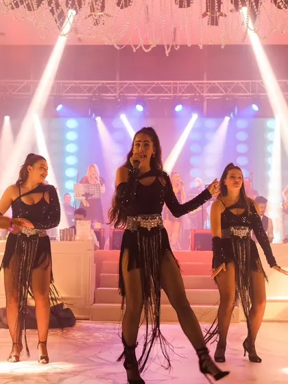 The stage is alive with performers at the Istanbul gala. We curate a full spectrum of entertainment to keep the energy high throughout the night.