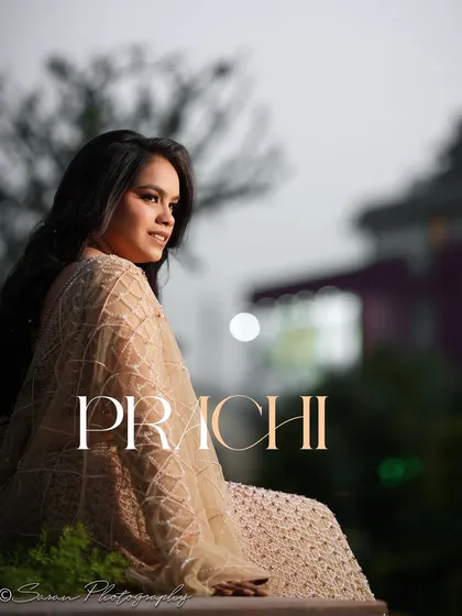 A serene outdoor portrait of a bride in a beautiful beige lehenga, with her name elegantly written on the image.