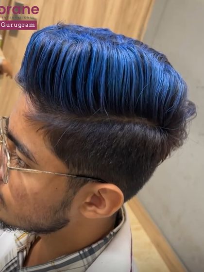 A bold and crazy blue hair color for a male client. My hair courses are comprehensive and cover men's grooming, including modern cutting and creative coloring techniques.