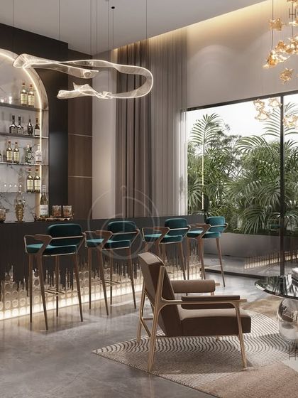 We’ve planned this bar corner to feel like an extension of the home, equal parts inviting and indulgent. Plush seating, ambient lighting, and just the right dose of drama create a space that holds court for evening conversations.