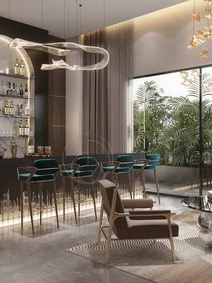 We planned this bar corner to be both inviting and indulgent. The design features a backlit arched display, a unique illuminated base, and plush teal velvet bar stools for evening conversations.