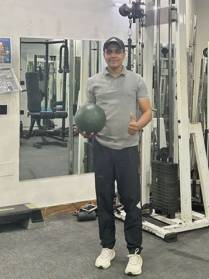 Another shot with the medicine ball, a versatile piece of equipment for various exercises.