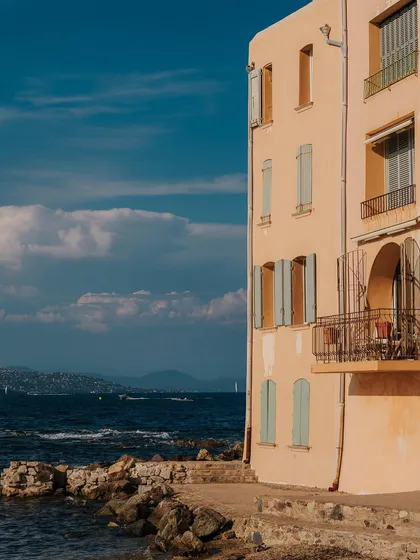 A sunlit building meets the sea in St. Tropez. This is an example of my lifestyle destination imagery, focusing on the color, light, and architecture that give a location its signature feel.