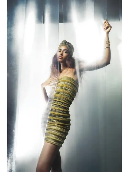 A motion-blur version of the mini-dress shot. This technique adds a layer of artistic abstraction and energy to the lookbook image.