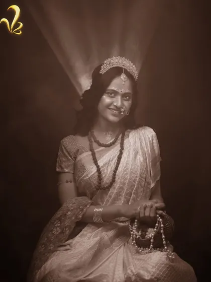 A serene portrait of Brahmacharini, holding prayer beads. The sepia tone and soft lighting enhance the feeling of introspection and unwavering focus on her path of growth.