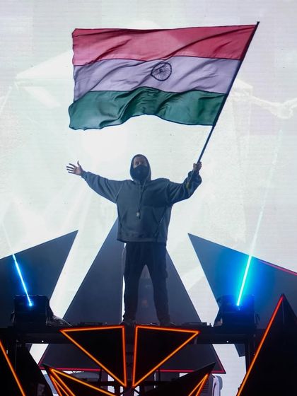 Alan Walker, a man of the people, proudly waves the Indian flag during his Walker World India Tour.