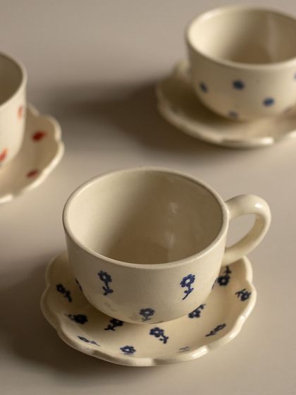 How adorable are these hand-painted cup and saucer sets? The delicate floral patterns make them almost too pretty to use.