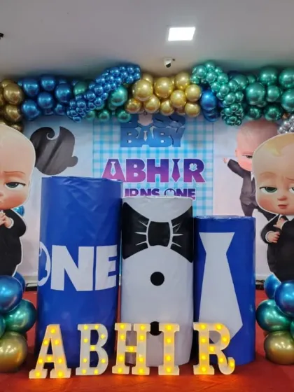 A fun Boss Baby theme for a first birthday party. We use character cutouts, themed props, and marquee letters with the baby's name to create an exciting stage setup for cake cutting and photos.