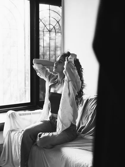 An expressive, candid moment captured in black and white. This feels very authentic and full of emotion.
