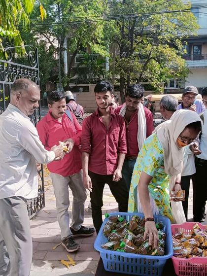 People from the community gathering to share in the celebration.