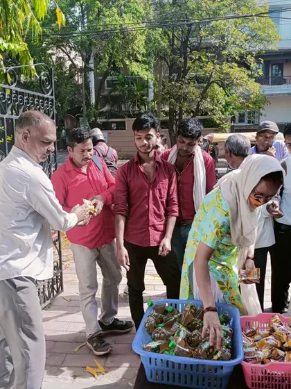People from the community gathering to share in the celebration.