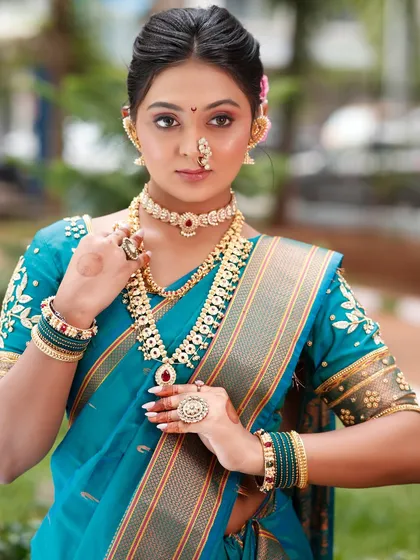 The complete bridal attire, from the intricate jewelry to the perfectly placed bindi. This is the kind of portfolio-worthy shot our students learn to create.