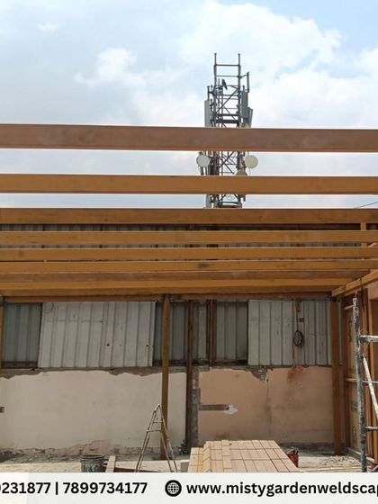 The completed metal framework for a large terrace pergola. The grid is designed to provide optimal support for the roofing material while maintaining a clean and open feel.