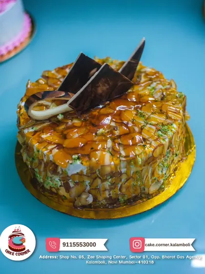 A crunchy and delicious Almond Delight cake. It's covered in toasted almonds and caramel, offering a wonderful texture and nutty flavour.