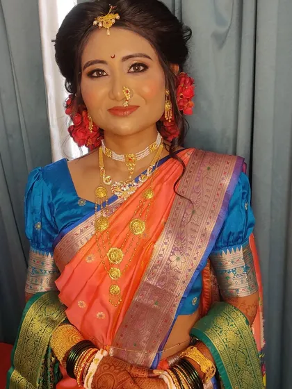 Priyanka looking radiant and happy in her complete Maharashtrian bridal look.
