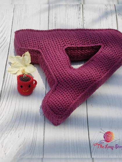 This personalized 'A' alphabet pillow was part of a special gift set for my coffee-loving brother-in-law. It's a great example of a thoughtful, custom-made present.