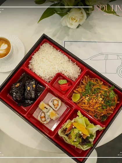We extend our culinary excellence to corporate hospitality. This gourmet bento box, curated for a global mobility expo, features a balanced Pan-Asian meal with sushi, pad thai noodles, and a fresh salad, demonstrating our sophisticated meal solutions for exclusive events.