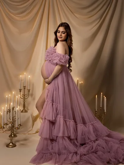 A side view of the ruffled gown, showing its incredible texture and volume.