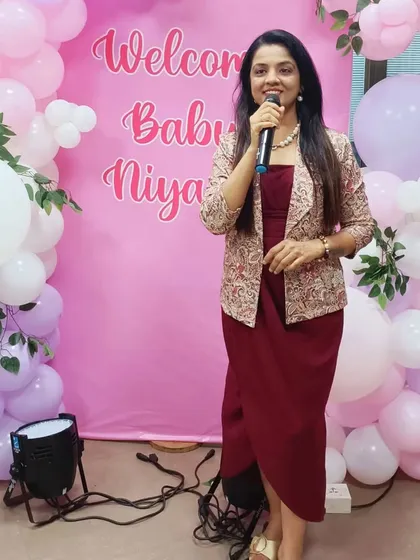 A picture from the 'Welcome Baby Niyara' event. The beautiful pink decor created the perfect backdrop for a day filled with joy, music, and games.