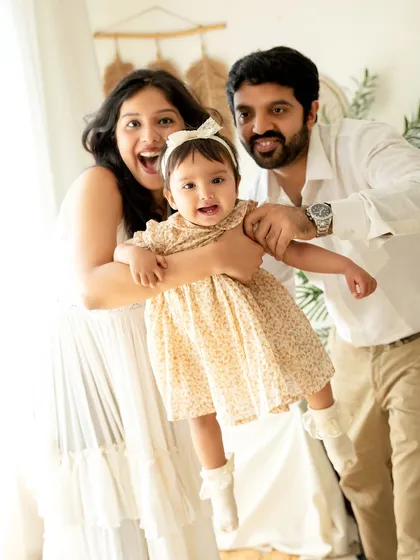 Pure, unrestrained family fun. I encourage playful moments like this during our sessions to capture the true spirit and happiness of your family celebrating a special milestone.
