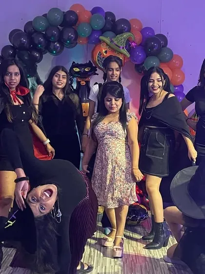 Our witches and vampires striking a pose at the Halloween party. We love any excuse to dress up and have a good time.