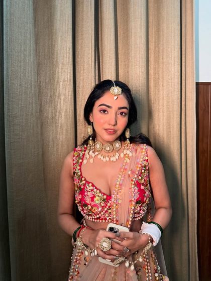 Another shot of Neha's minimal Haldi makeup. It's all about enhancing her natural beauty and keeping it fresh.