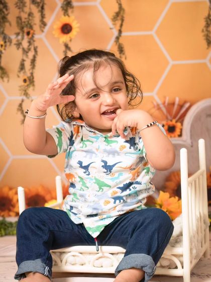 A collection of candid and playful moments from a sunflower-themed session, showing a range of expressions from curious to joyful.