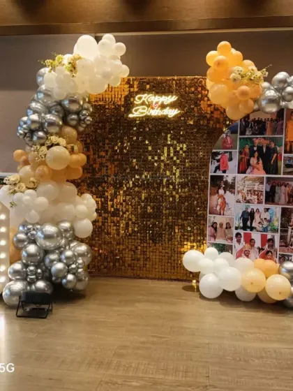 A closer view of the 60th birthday setup, showing the detail of the arched photo collage panel. It's a beautiful way to display precious memories alongside the glamorous decor.