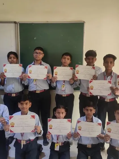 Students at Rawal Convent School in Faridabad proudly display their certificates after a robotics workshop. We are committed to blending ancient mathematical wisdom with modern technology.