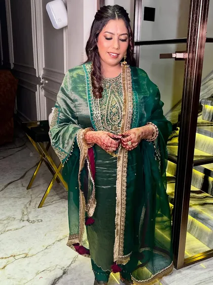 A candid moment, capturing her natural beauty and the elegance of the look.