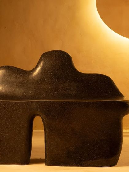 The unique, flowing silhouette of the Coral Seating bench is highlighted in this shot. It’s a piece that reflects the effortless elegance of a coral reef, designed to be both a comfortable seat and a work of art.