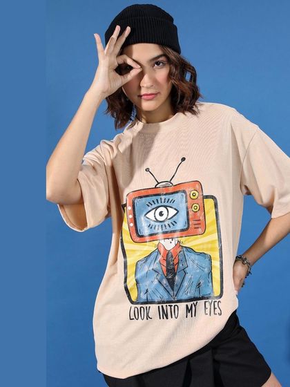 This shot captures the playful attitude of the streetwear concept. The model's pose and expression, combined with the cool and casual styling, create an engaging image for any brand campaign.