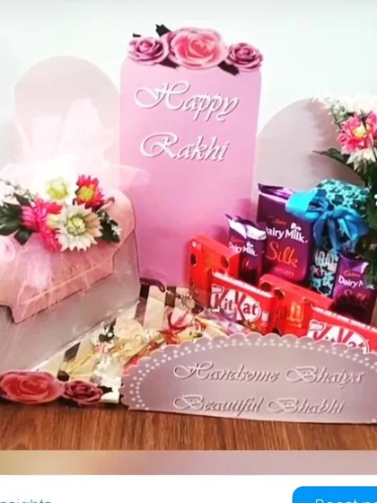 This elegant Rakhi gift set is specially designed for your brother and sister-in-law. It includes a stylish handbag for your bhabhi, a selection of premium chocolates, and beautiful floral arrangements, all presented in a coordinated pink theme.