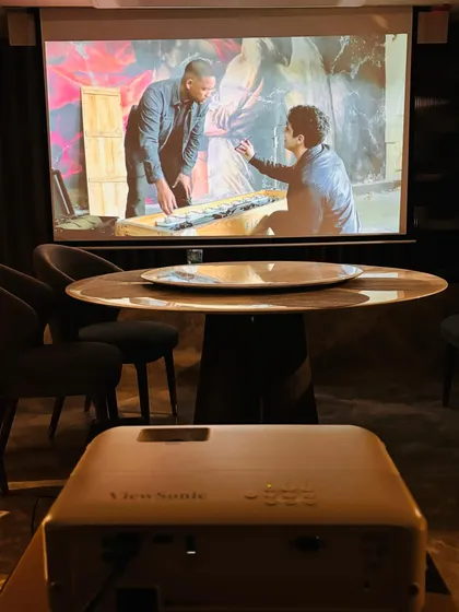 This is what movie night should feel like. A ViewSonic projector creating a massive, vibrant picture that turns your dining room or any space into a personal cinema. Ditch the small screen and let's talk about a real big-screen experience.