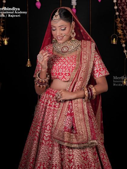 An elegant pose that captures the festive and bridal spirit. We celebrate all festivals with creative makeup sessions at the academy.