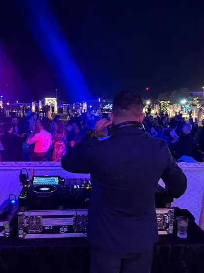 From behind the console at a beautiful outdoor reception in Jaipur. My job is to keep an eye on the crowd and adjust the music to match their energy.