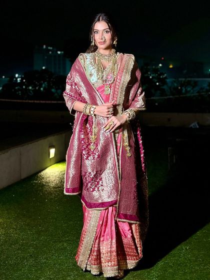 A full view of this royal Maharashtrian ensemble. The soft glam makeup with rose-tinted lips creates an aura that is effortlessly regal, where culture meets couture.