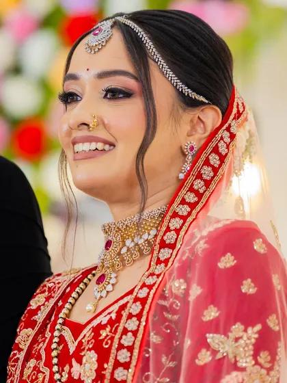 A close-up of her joyful expression, showing how the makeup enhances her happiness without looking heavy.